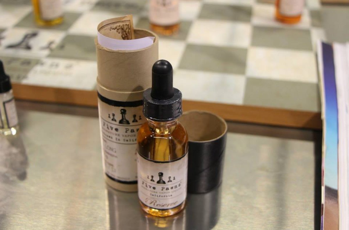 Closed e-liquid bottle stored upright